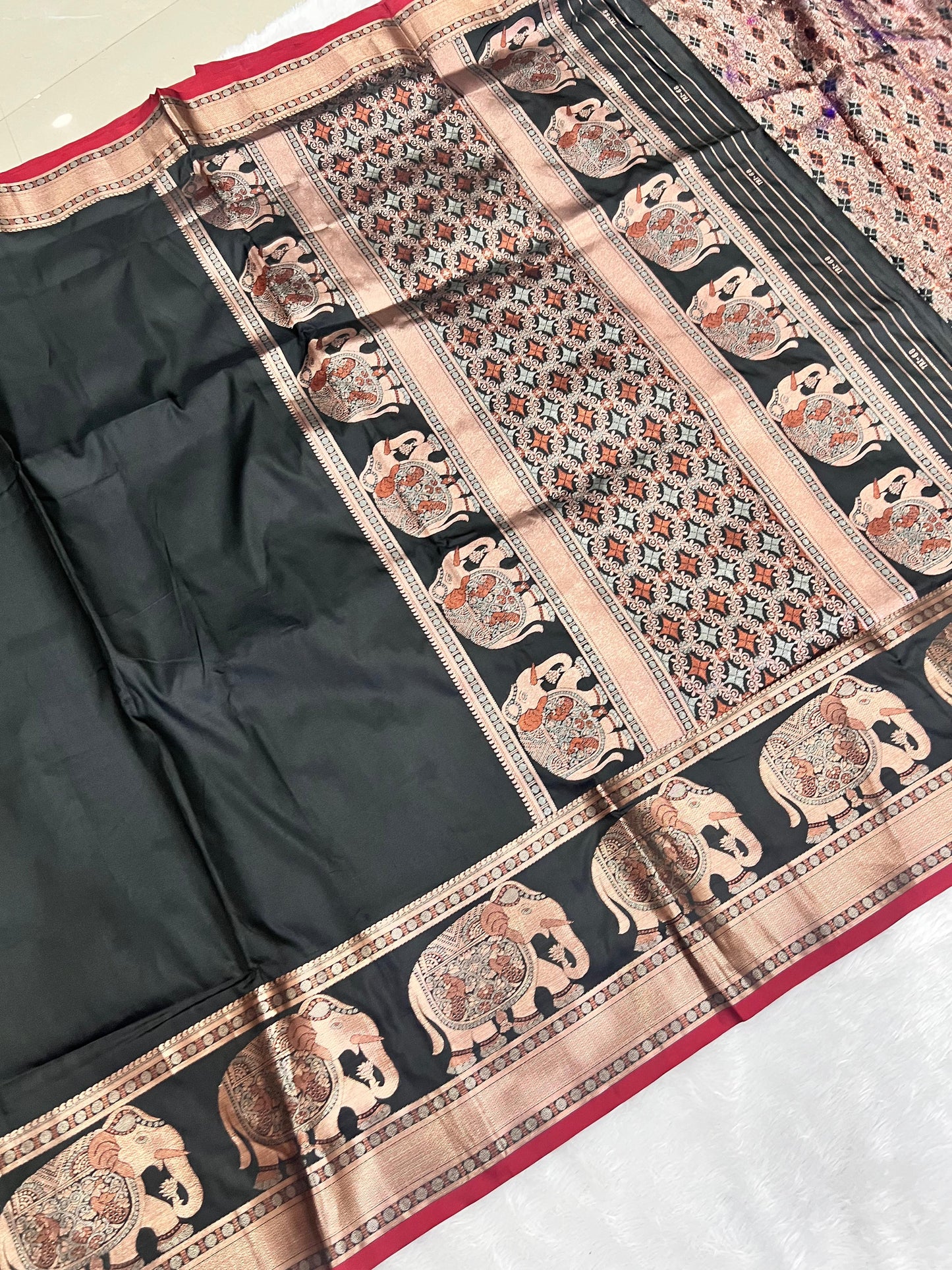 Banarasi - Elephant design on border & pallu with rich copper zari weaving