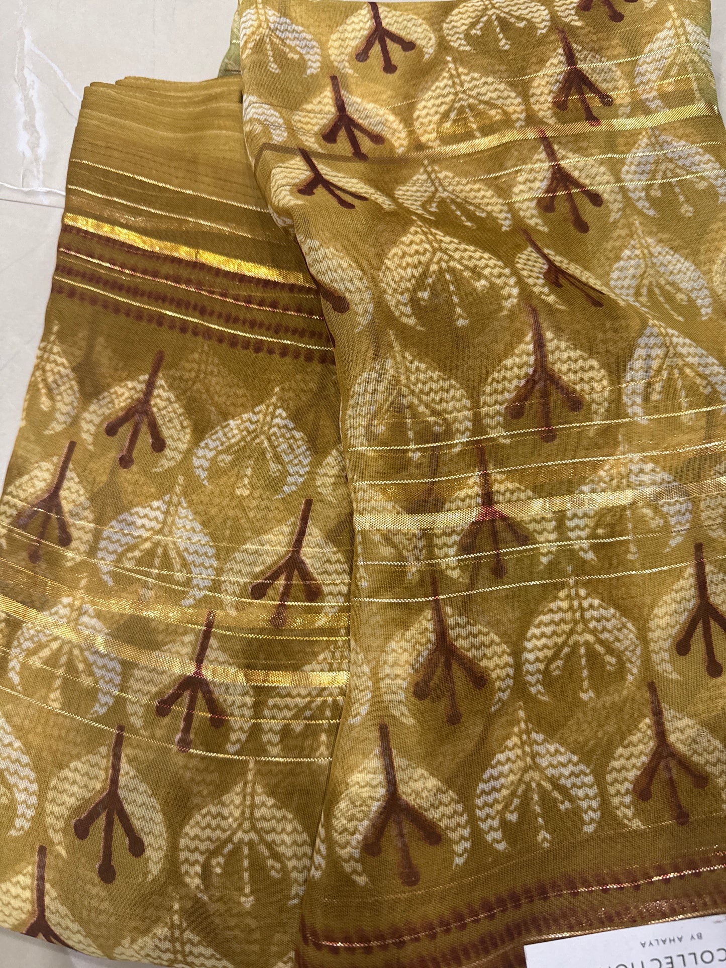 Georgette with golden weaving line