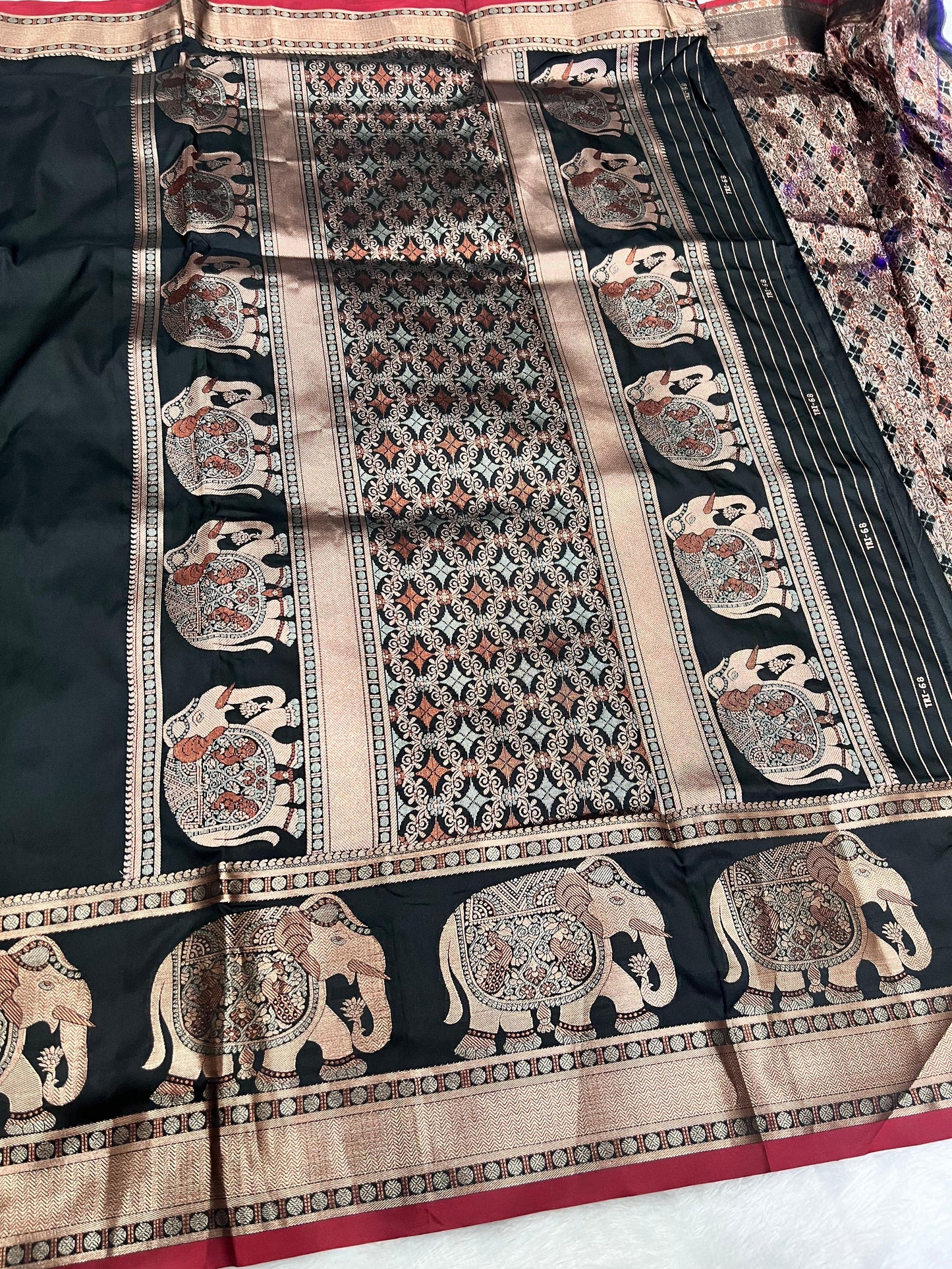 Banarasi - Elephant design on border & pallu with rich copper zari weaving