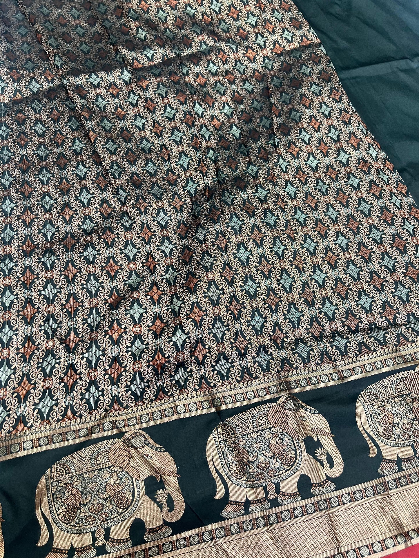 Banarasi - Elephant design on border & pallu with rich copper zari weaving