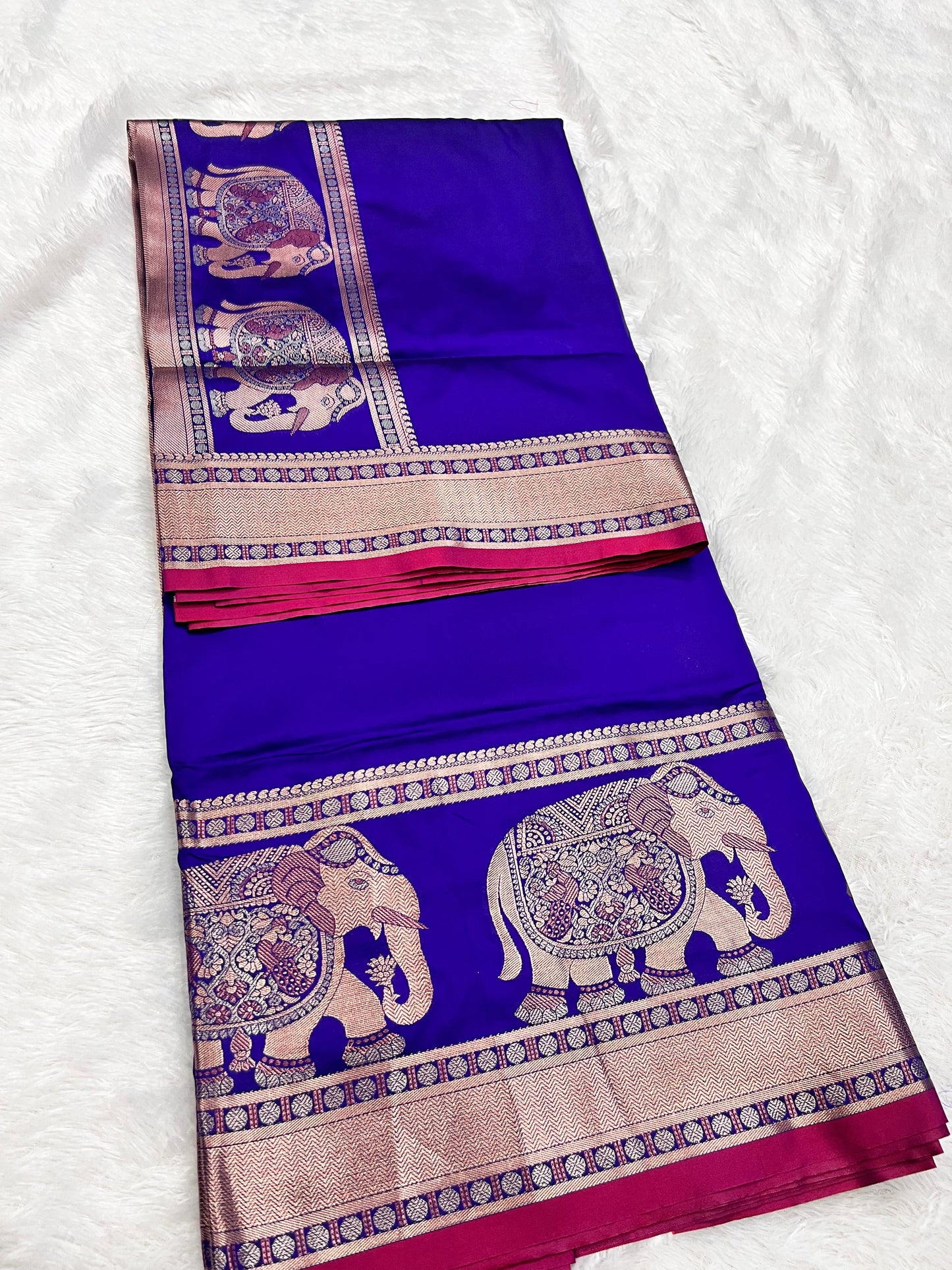 Banarasi - Elephant design on border & pallu with rich copper zari weaving