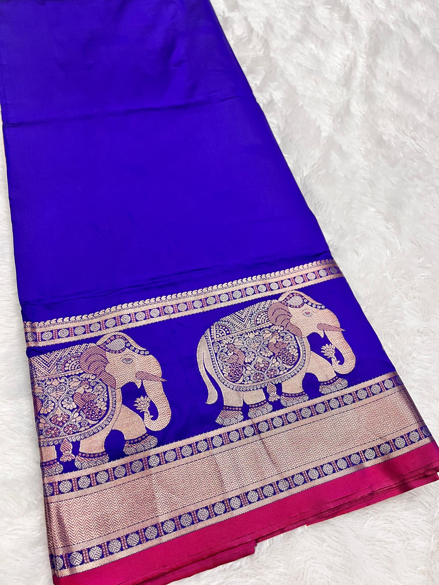 Banarasi - Elephant design on border & pallu with rich copper zari weaving