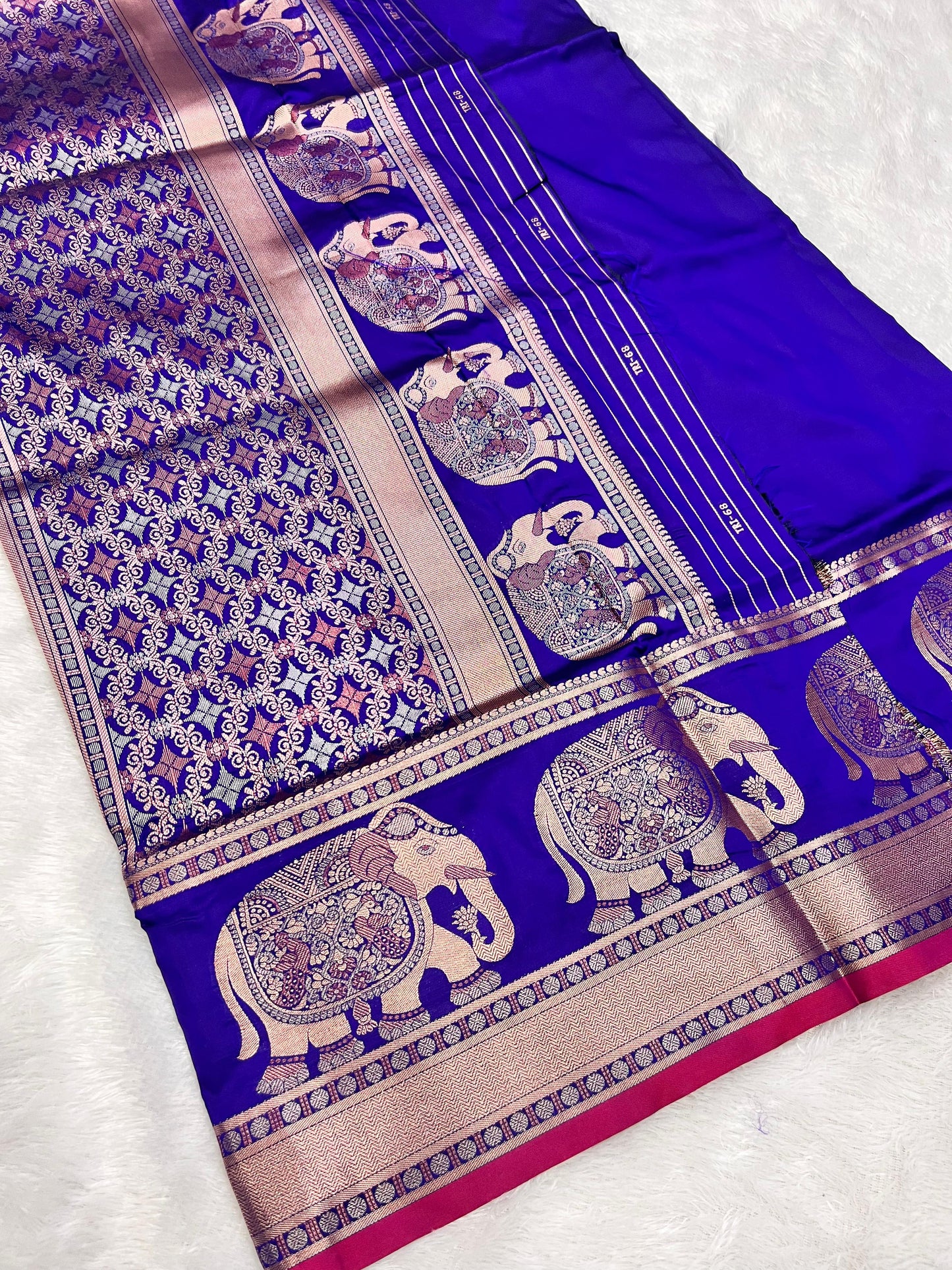 Banarasi - Elephant design on border & pallu with rich copper zari weaving