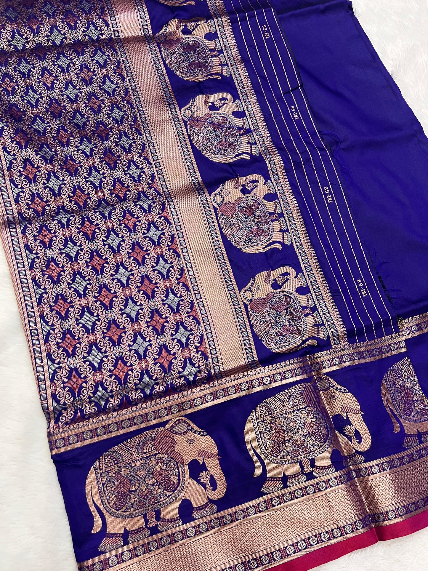 Banarasi - Elephant design on border & pallu with rich copper zari weaving